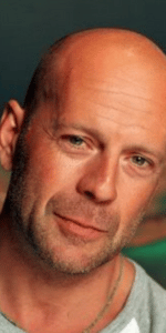 Bruce Willis - an example of a bald-headed man with stubble.