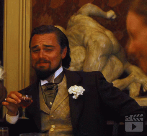 GIF of Leonardo DiCaprio (and his Hollywood beard) in Django Unchained.